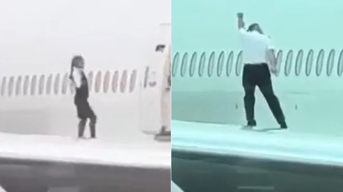 Crew members dancing on the wing of an airplane, a dangerous stunt that has received widespread publicity ➤ Главное.net